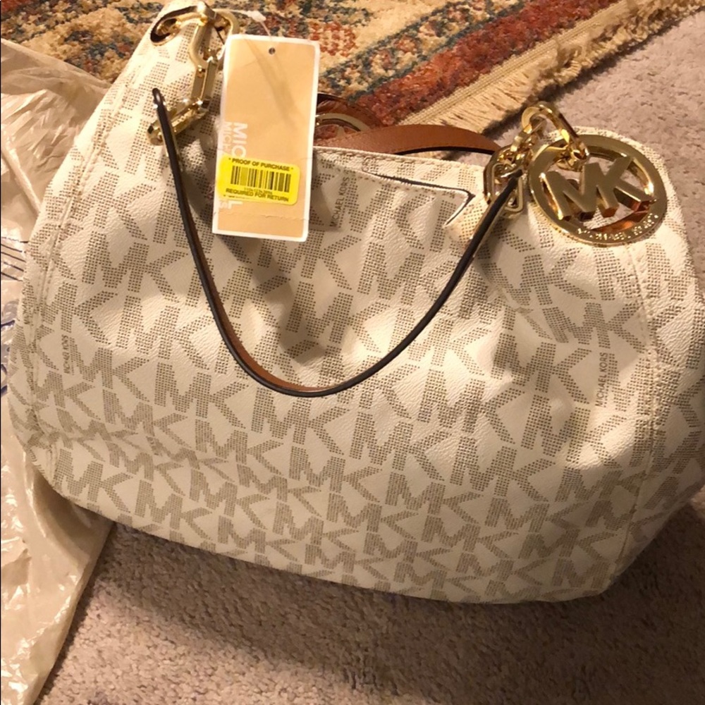 Michael Kors brand new purse from Dillard’s.